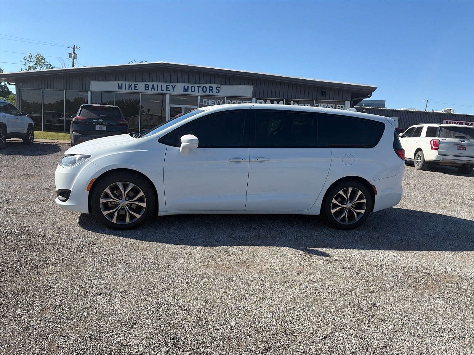 2018 Chrysler Pacifica Touring Plus in White — front three-quarter view